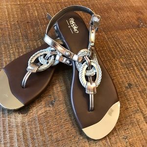Silver sandals with rope detail.